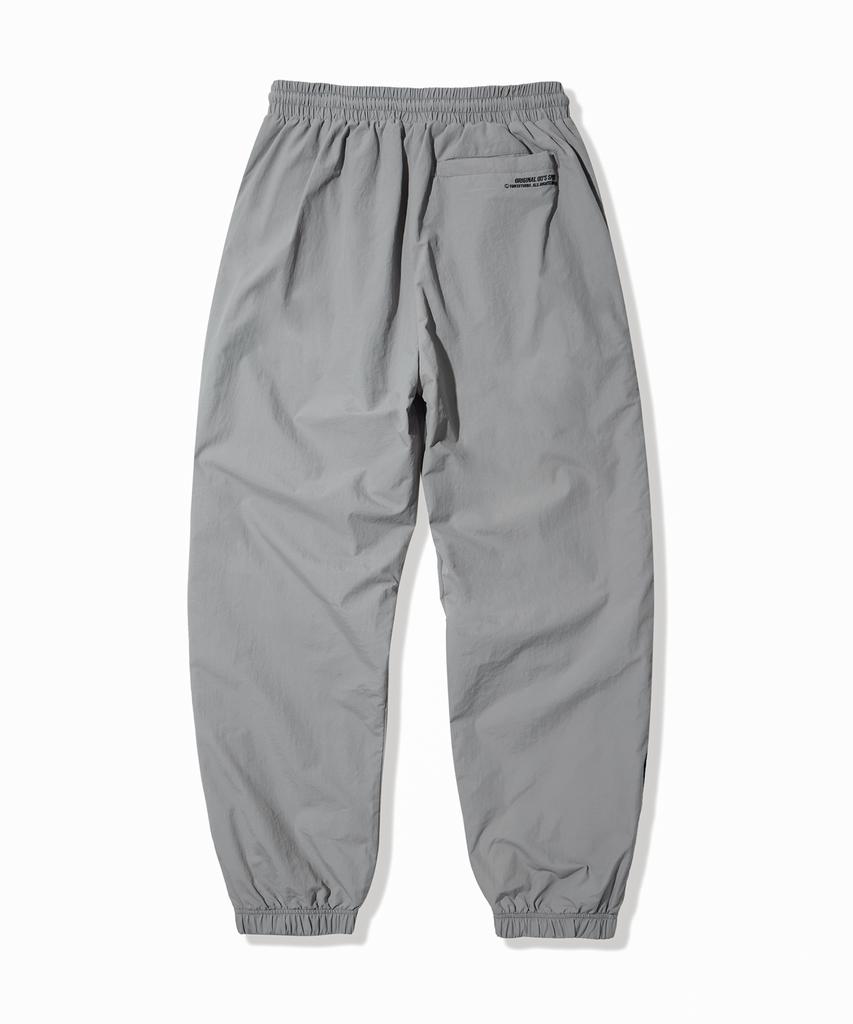 1993STUDIO Symbol Logo Curve Color Block Nylon Pants_Gray
