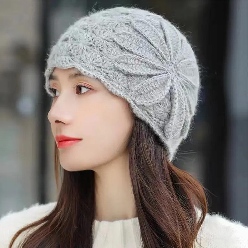 Autumn and winter fashion hollow knitted wool hat women's ear protection simple fashion big head circumference cold hat flower pullover hat