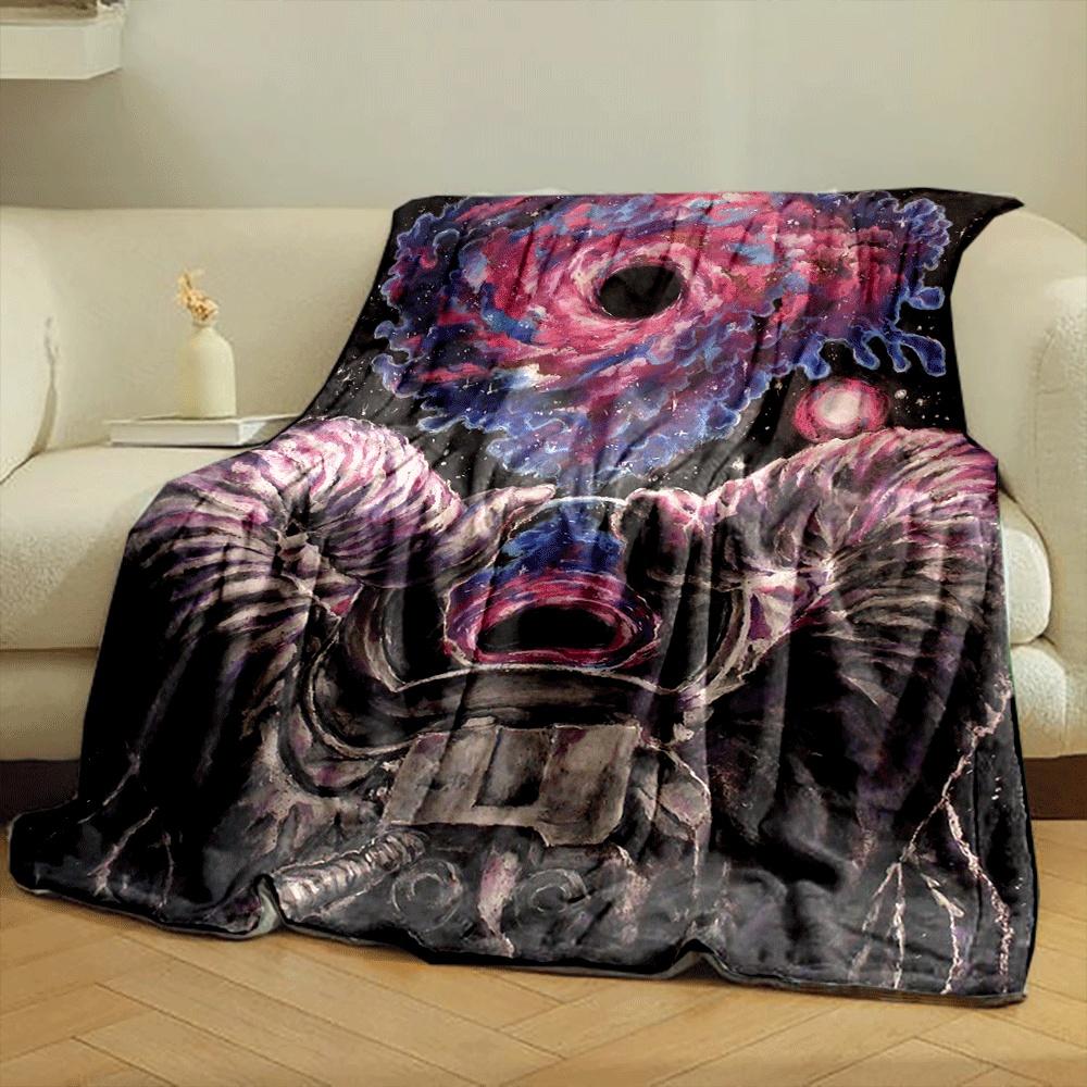 An astronaut holding a glowing portal with a swirling galaxy pattern. for all seasons blanket lunch break throw gift
