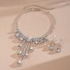 Diamond-embellished round hollow tassel earring and necklace set, light luxury with a high-end feel, clavicle chain, fashionable and elegant
