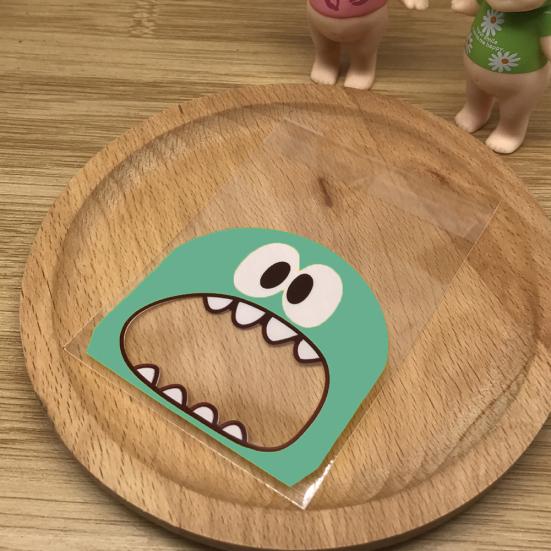 100 шт., самоклеящиеся подарочные пакеты с мультяшным монстром и принтом, печенье, конфеты