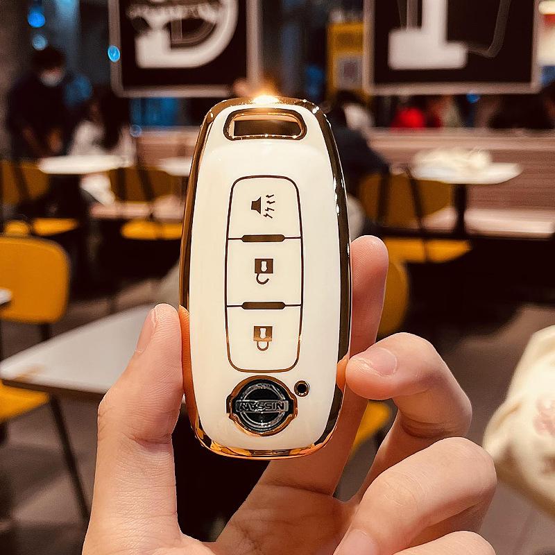 Применимо2023Новый чехол для ключей Nissan Teana Xuan Yi Сумка Nissan седьмого поколения Qashqai Qijun Shell22Сумка с пряжкой