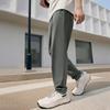 Fila СС25 А.П.. Уличные Минималистичные Повседневные Универсальные Удобные Прохладные Повседневные Брюки Мужские брюки Морозно-Серый A11M521602F-DY