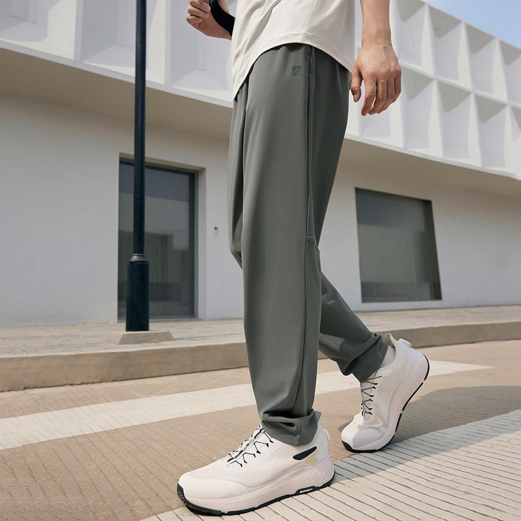 Fila СС25 А.П.. Уличные Минималистичные Повседневные Универсальные Удобные Прохладные Повседневные Брюки Мужские брюки Морозно-Серый A11M521602F-DY