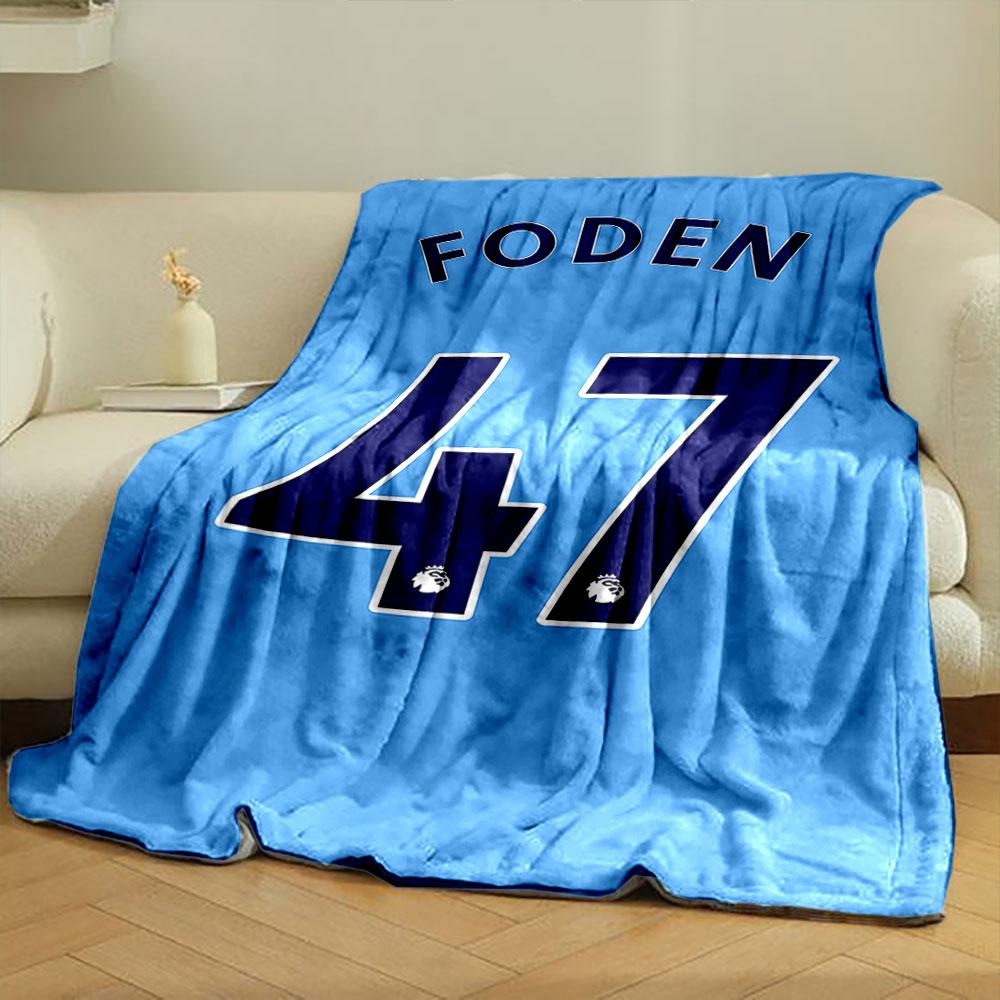 Blue background with "FODEN" and large navy "47" outlined in white. for all seasons blanket lunch break throw gift