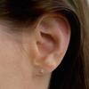 Серьги-гвоздики из 14-каратного золота с астерами и кубическим цирконием