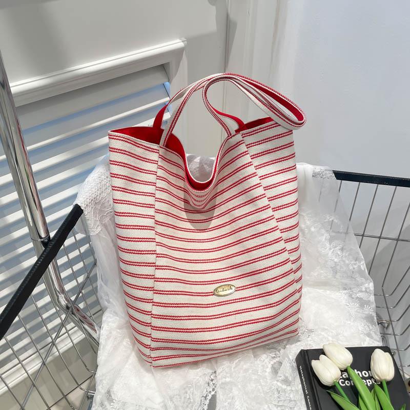 Нишевый дизайн литературный стиль досуг 2025 весна зарубежный стиль сумка-тоут милое ленивое ощущение персонализированная сумка через плечо женская