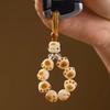Qiong Rui Charcoal-Burned Fortune Cat Paw Phone Strap Bodhi seed soft-touch ornament paired with car key chain