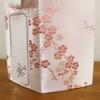 Buddhist urn, plum blossom design, silk, 3.5 inches, pink, with posthumous Buddhist name sticker, urn cover only