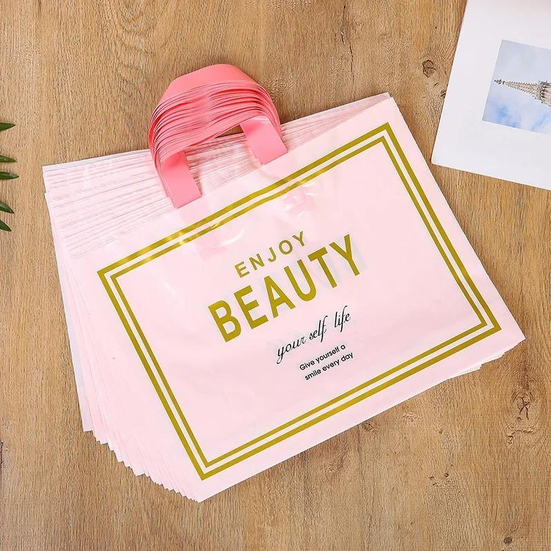 50 шт., новые модели, сумки толщиной 0,14 мм, прочная одежда, косметический подарок, сумки для покупок, эластичные, мощные, портативные, портативные упаковочные сумки