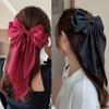 Korean Style Ponytail Hairpin: Pure Color Bow Spring Clip