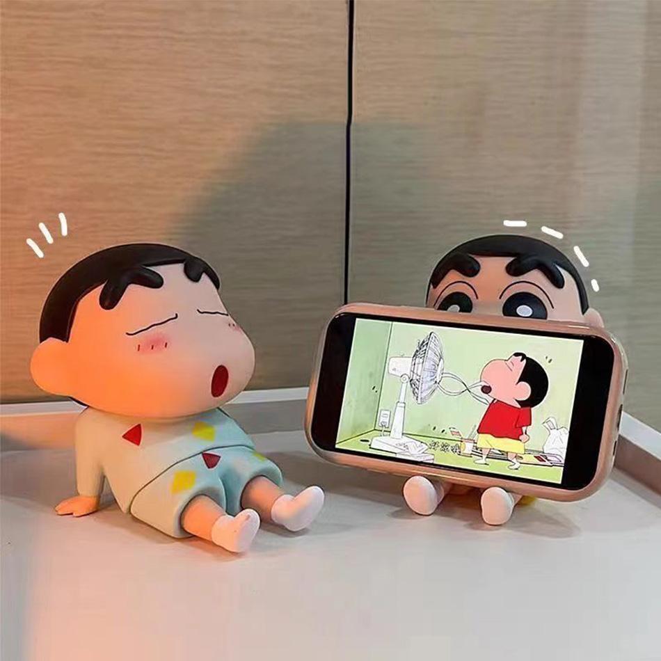 Kawaii Crayon Shin-Chan Figures Phone Holder Anime Desktop Ornaments Cartoon Watching TV Phone Support Cute Doll Decorations