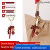 Wish-Fulfilling Bodhi Seed String Bag Charm - Hand-Woven Natural Keychain Ornament with Turquoise.