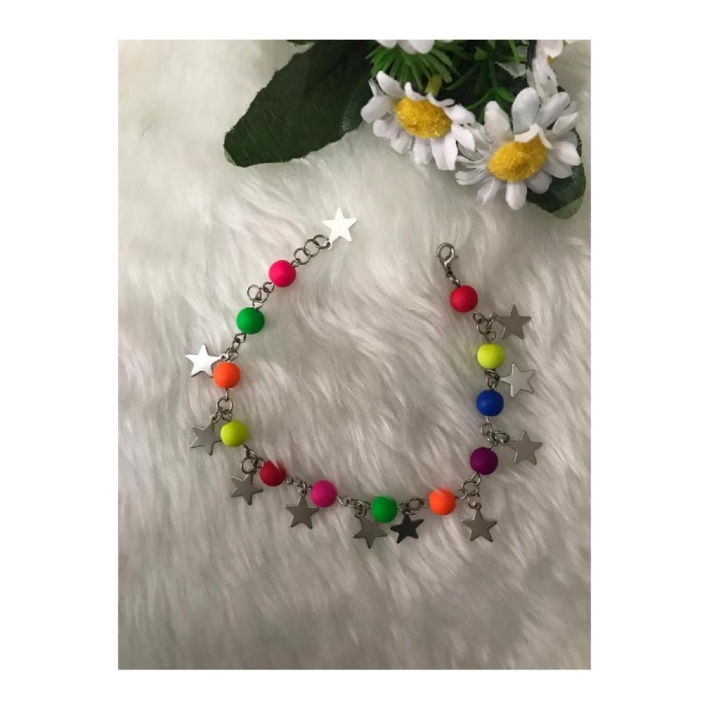 Женский браслет серого цвета со звездой