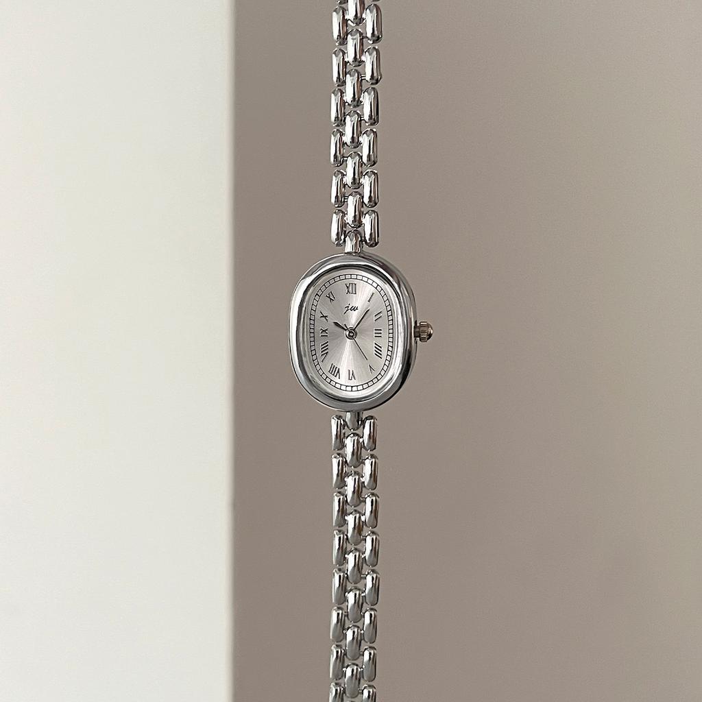 Authentic Jingwei Oval Vintage Women's Quartz Watch with Retro Roman Alloy Bracelet