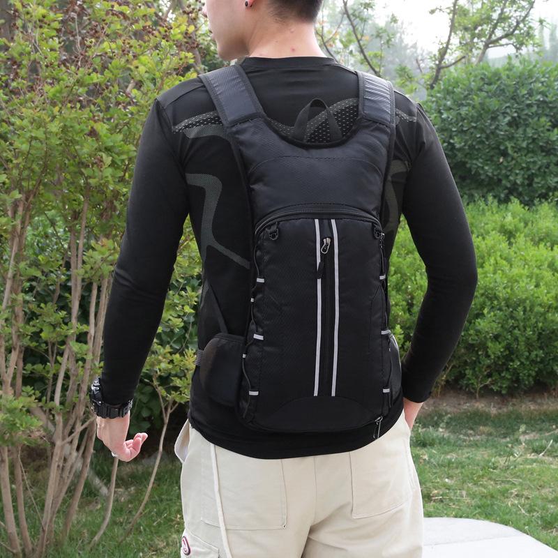 Lightweight, Breathable Outdoor Cycling Backpack with Water Bag & Helmet Storage - Unisex Wear-Resistant Design