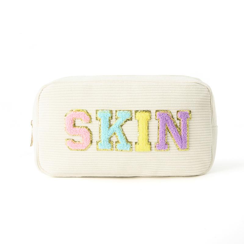 Travel-Friendly Corduroy Makeup Bag with High Capacity and Embroidered Lettering