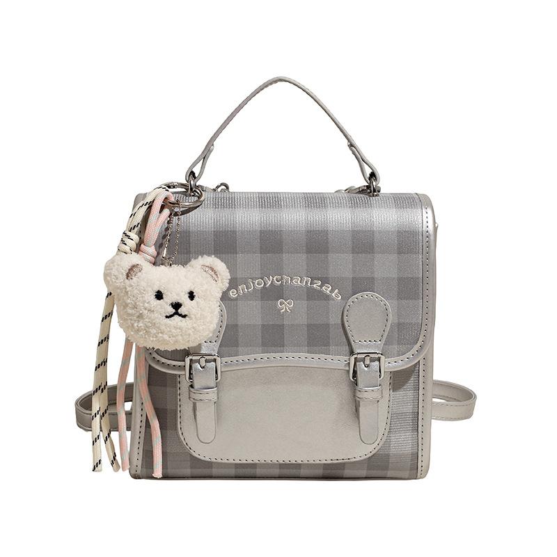 Casual plaid women's backpack 2025 summer new small backpack high value contrasting color portable small schoolbag