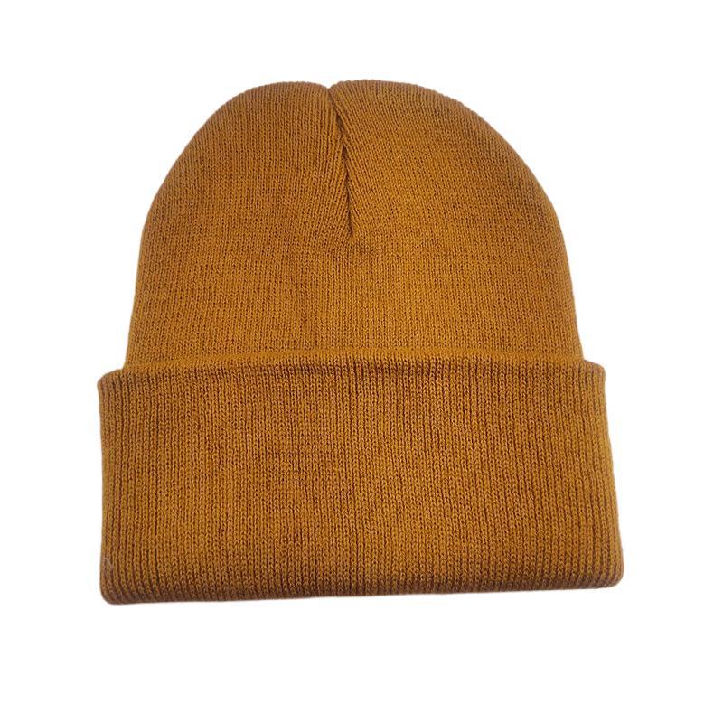 Уютные вязаные шерстяные шапки на осень и зиму - однотонные
