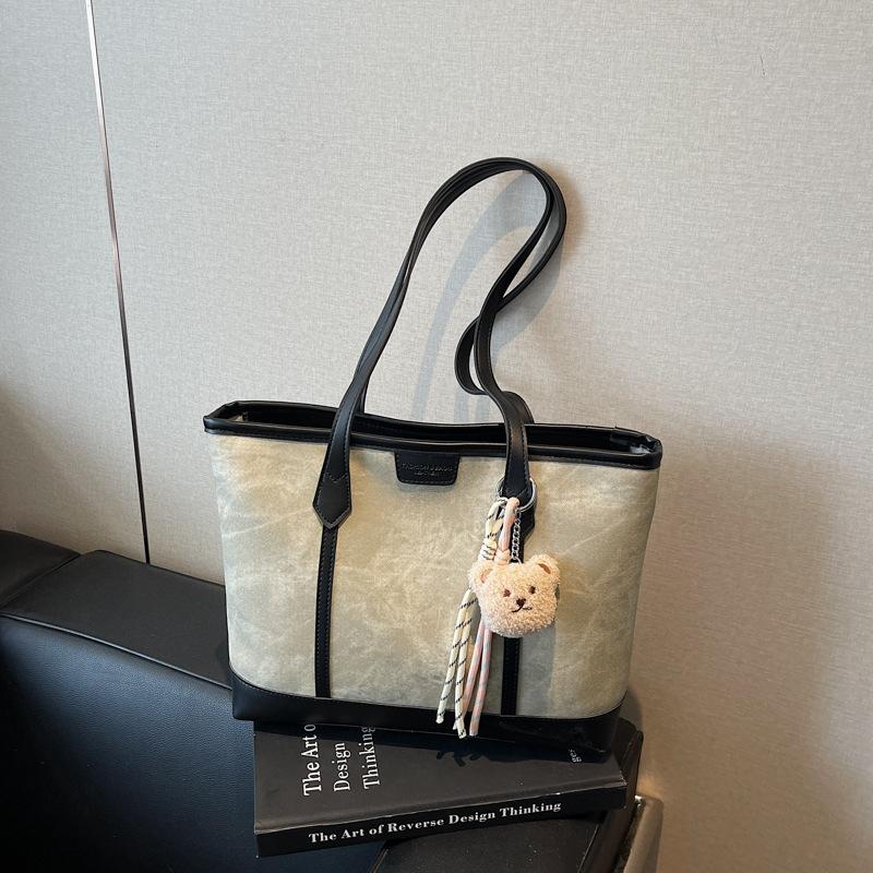 Простая сумка-тоут большой вместимости женская новая модная универсальная сумка через плечо нишевого класса сумка для通勤