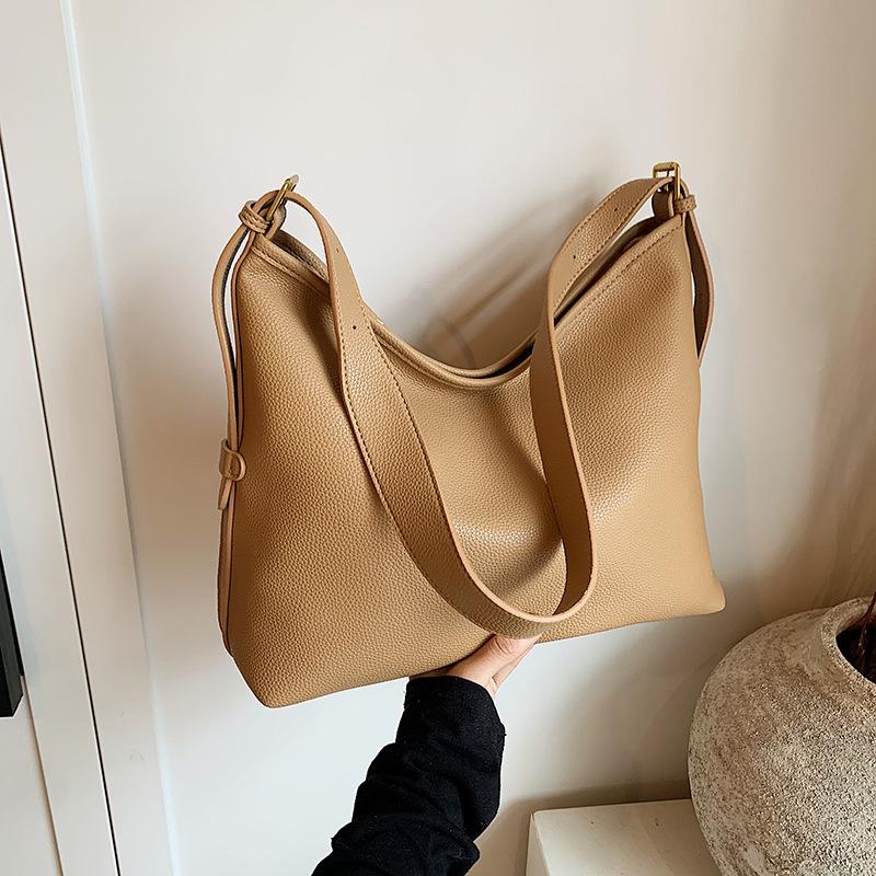 Премиальная сумка для поездок на работу женская 2024 новая повседневная универсальная сумка через плечо подмышкой простая темпераментная сумка-ведро