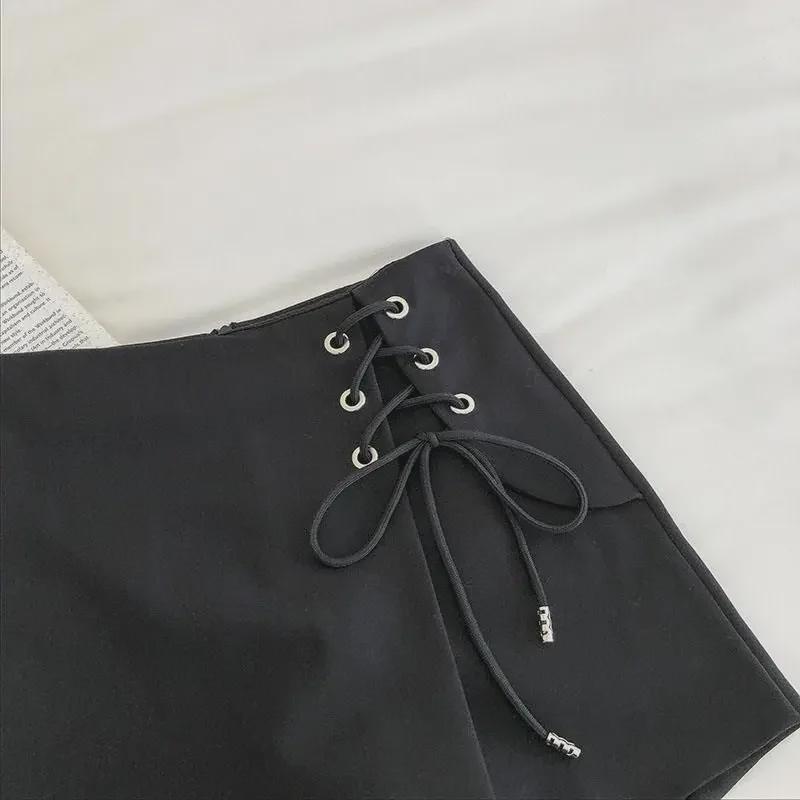 Черные костюмные шорты А-силуэта с завязками на талии — повседневные брюки широкого кроя с юбкой-солнце на весну/лето.