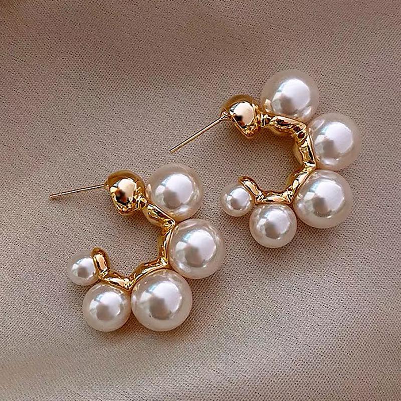 Серебряные серьги-кисточки с жемчугом и иглами - модные универсальные женские украшения