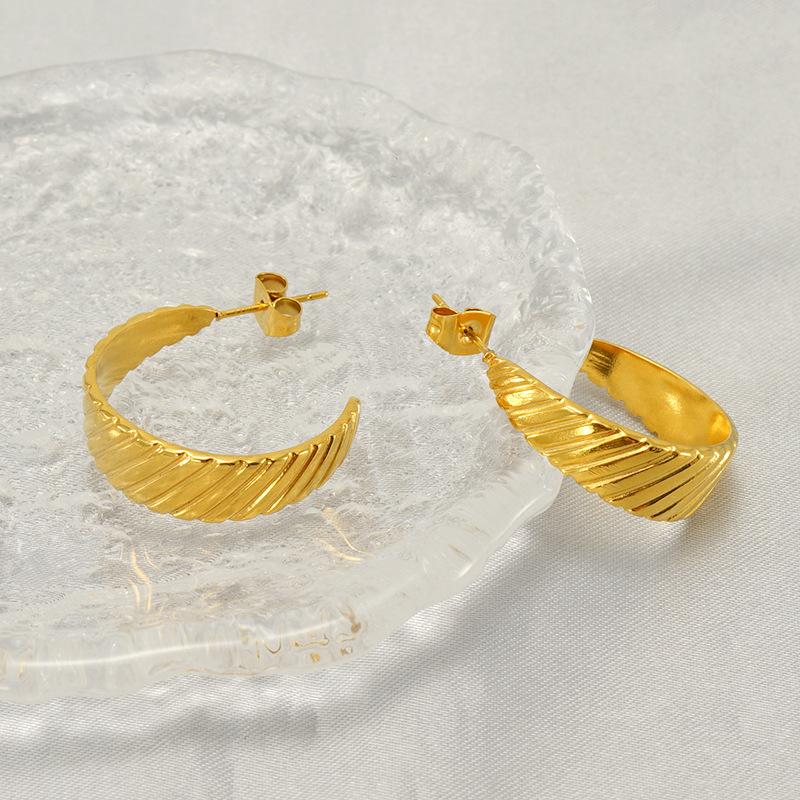 Модные спиральные серьги из нержавеющей стали Модный универсальный дизайн Легкие роскошные серьги из титановой стали Женские